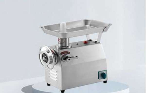 What types of meat can be processed using a Heavy Duty Meat Grinder?