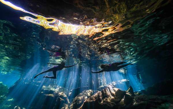 Captivating Elegance: Immersive Underwater Photoshoots in Tulum's Enchanting Cenotes